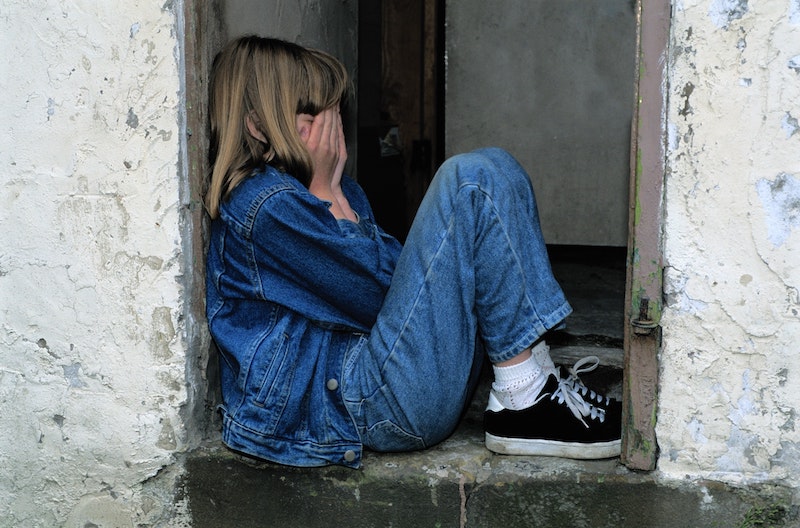 Freedom Counseling Center with a lady sitting at a door