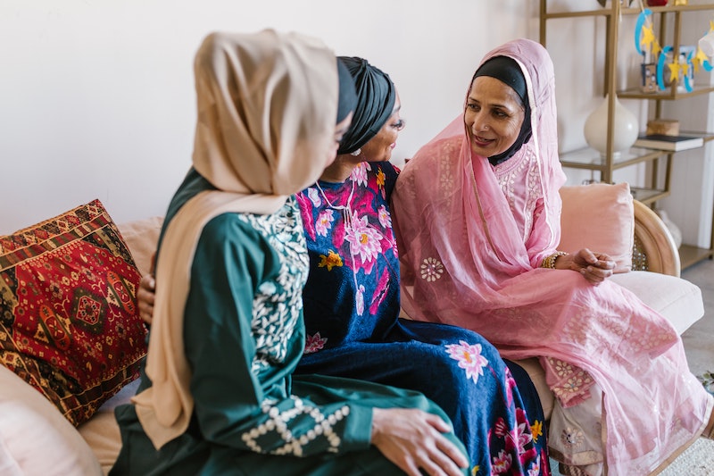 Three women wearing the hijabs